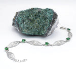 Sterling Silver Trinity Knot Bracelet With Green Crystals