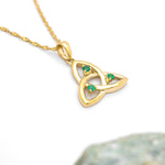 Gold Trinity Knot Necklace With Emeralds