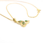 Gold Trinity Knot Necklace With Emeralds