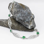 Sterling Silver Trinity Knot Bracelet With Green Crystals