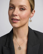 Gold Trinity Knot Emerald Earrings