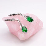Silver Celtic Trinity Knot Drop Earrings With Green Crystal