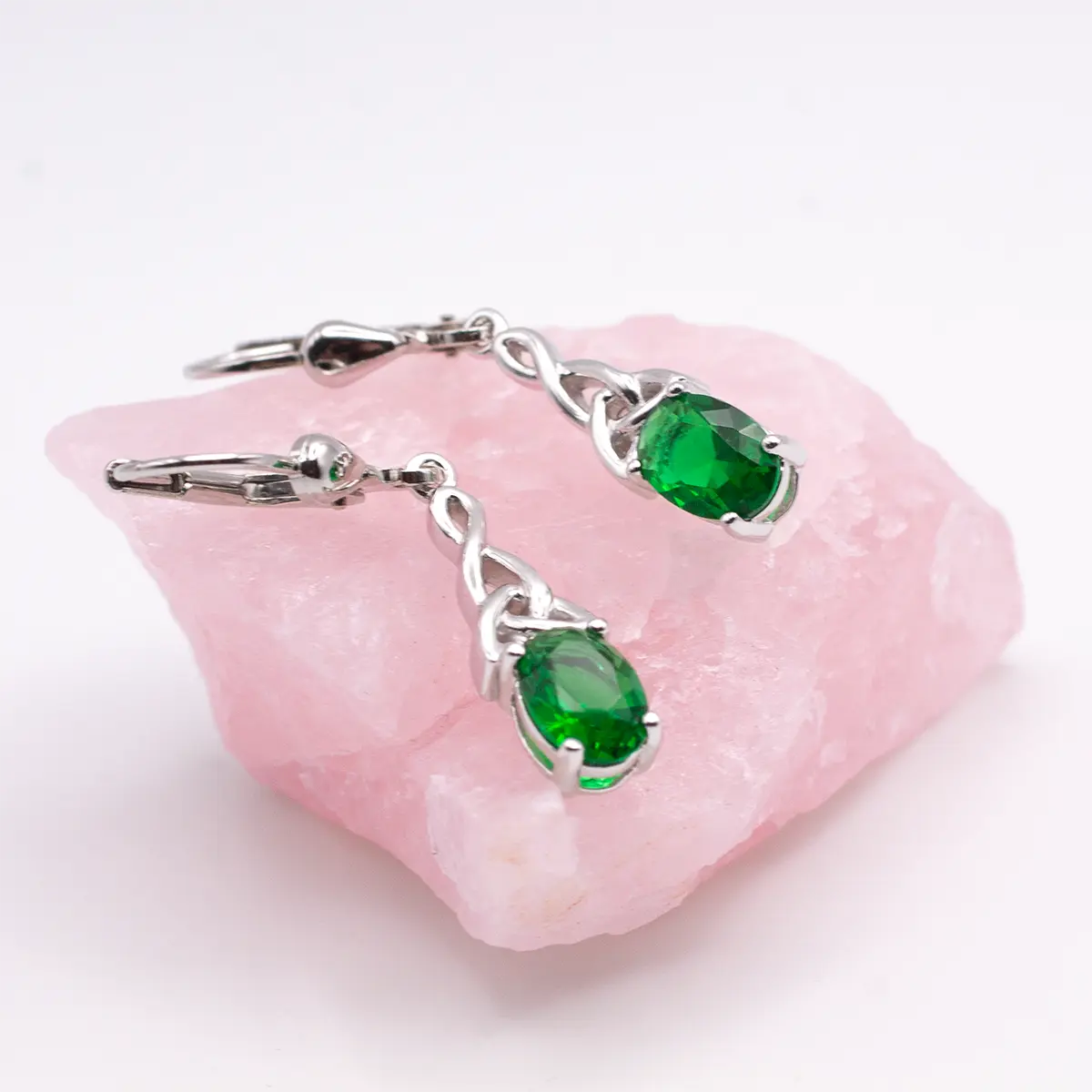 Silver Celtic Trinity Knot Drop Earrings With Green Crystal – view 3