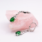 Silver Celtic Trinity Knot Drop Earrings With Green Crystal