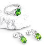 Silver Trinity Knot Ring With Green Crystal