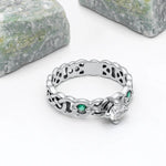 Celtic Knot Engagement Ring with Diamond and Emeralds