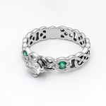 Celtic Knot Engagement Ring with Diamond and Emeralds
