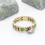 Celtic Knot Engagement Ring with Diamond and Emeralds