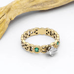 Celtic Knot Engagement Ring with Diamond and Emeralds